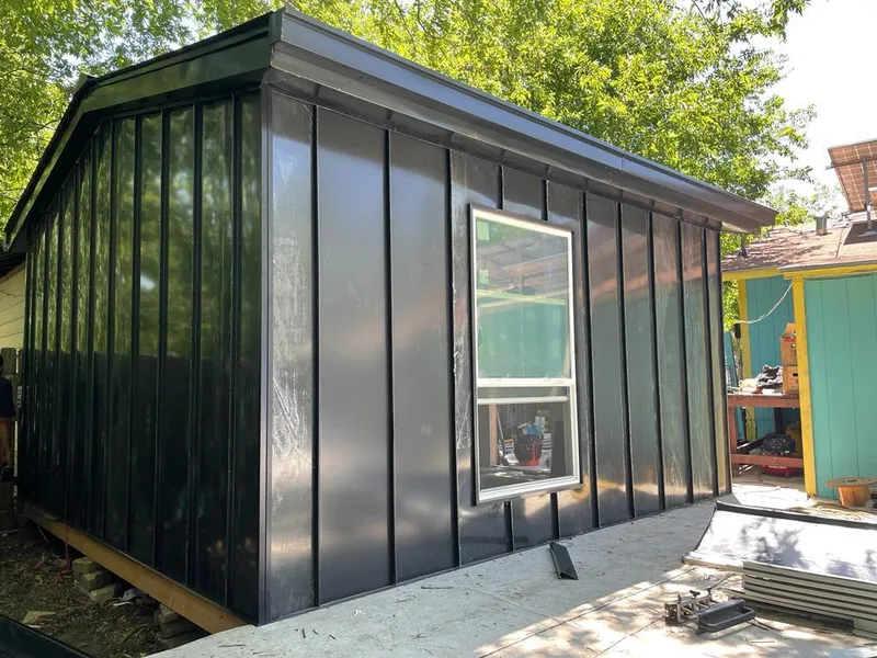 Black standing seam metal wall panels for Roof Inspection in Rincon