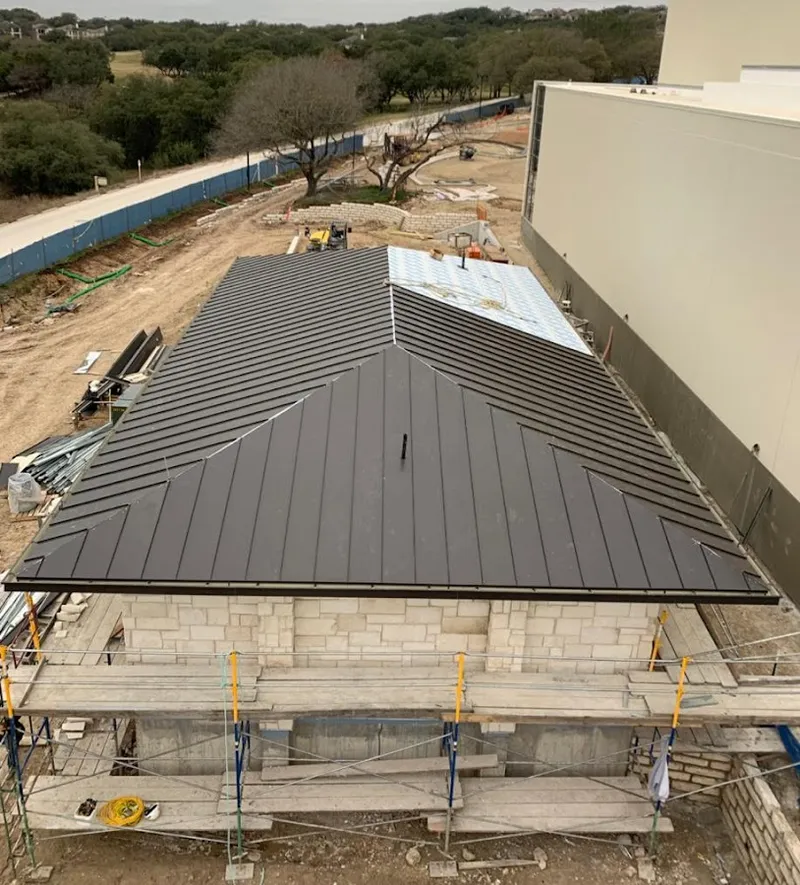 Metal roof new construction with scaffolding in Rincon